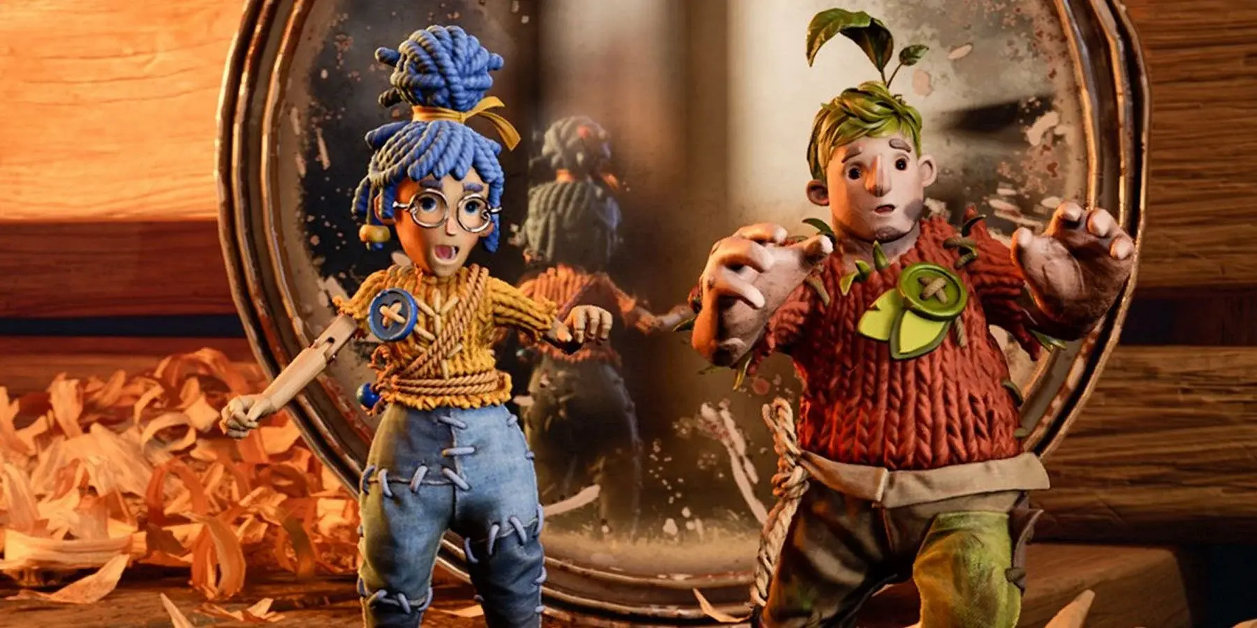 It Takes Two oyunundan bir sahne: Ayna karşısında duran iki karakterden mavi saçlı, gözlüklü kadın karakter ve yeşil saçlı erkek karakter iplerle birbirine bağlı halde şaşkın bir ifadeyle geri çekiliyor. Sıcak ışık, sahneye masalsı bir hava katıyor.